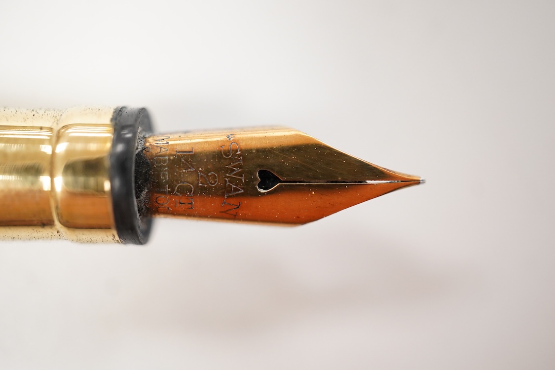 A Mabie Todd & Co. Swan gold filled lever filler. Made in USA with No.2 14ct. gold nib